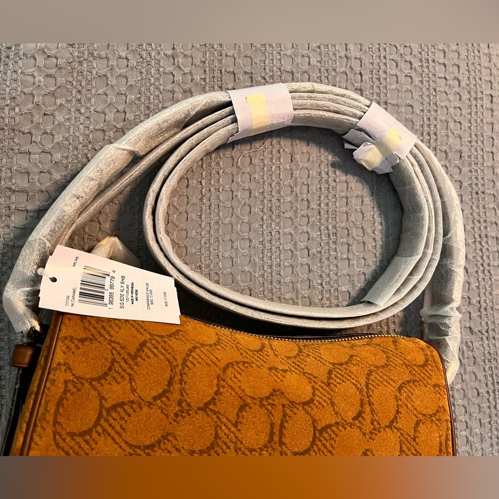 Coach Kailey Shoulder Bag
In Signature Suede - Picture 9 of 14